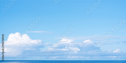 Canvas Print Sky, cloud and bright sun light on clear blue Background,Summer sky over sea beach,Panoramic seascape with sunlight on sea water in Spring