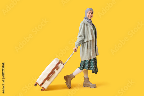 Smiling young muslim woman ...