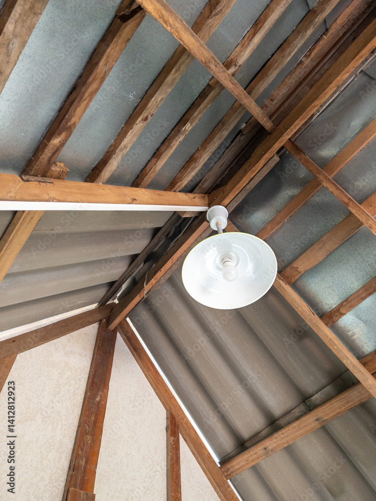 White Hanging Lamp on a Wooden Roof Structure.