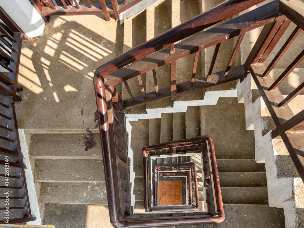 Top-Down View of a Spiral Staircase Inside a Bird-Watching Tower.