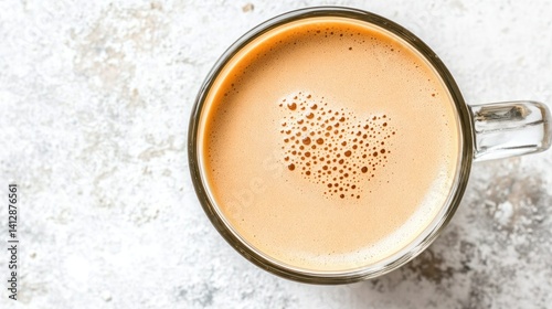 Latte Art in Glass Mug on Stone Background
