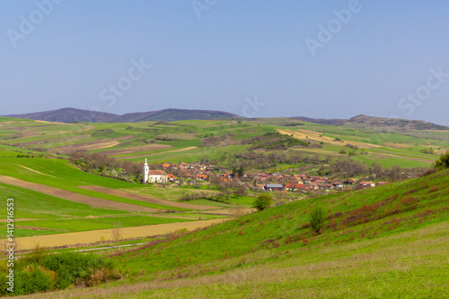Obraz na płótnie Landscape of a village in a hilly area in Romania seen from a distance w salonie