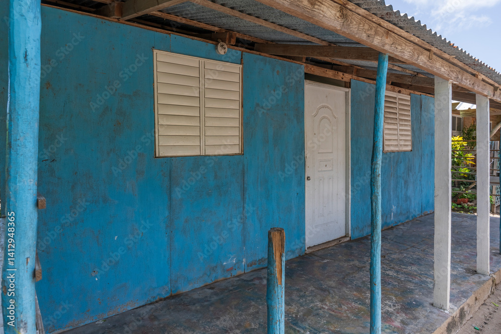 Typical colorful house of the Saona Island,humble houses of native people village,Mano Juan fishing village,Dominican Republic.