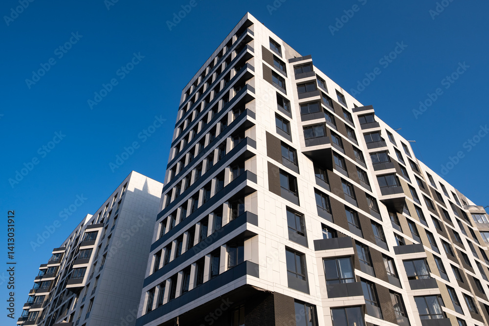 Facade of a modern apartment building. Construction of a residential complex. April 08, 2025 Almaty Kazakhstan Facade of a modern apartment building. Construction of a residential complex. April 08, 2025 Almaty Kazakhstan