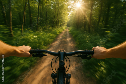 Speeding through forest trail on bicycle at golden hour with motion blur and sun flare