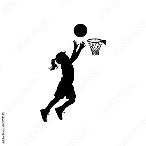 Silhouette of a young girl playing basketball