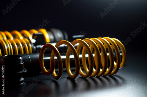 yellow springs black shock absorbers coilovers for lowering and adjusting car clearance