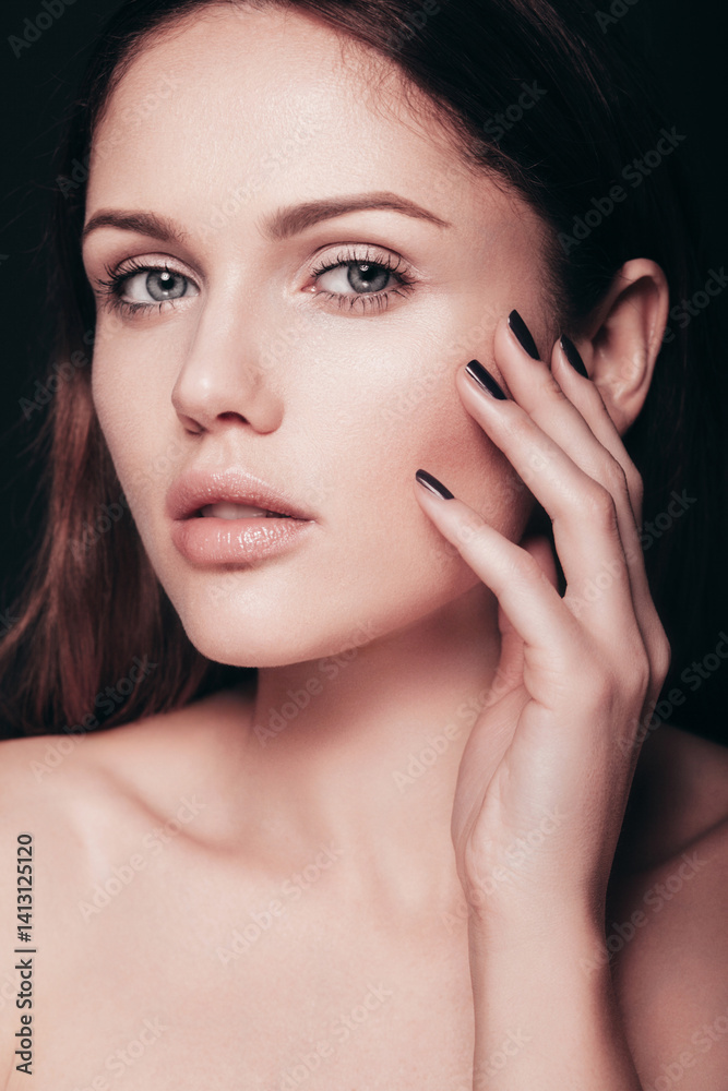 Fashion beauty portrait of young brunette woman with natural makeup and perfect clean skin. Pure model with posing in studio Fashion beauty portrait of young brunette woman with natural makeup and perfect clean skin. Pure model with posing in studio