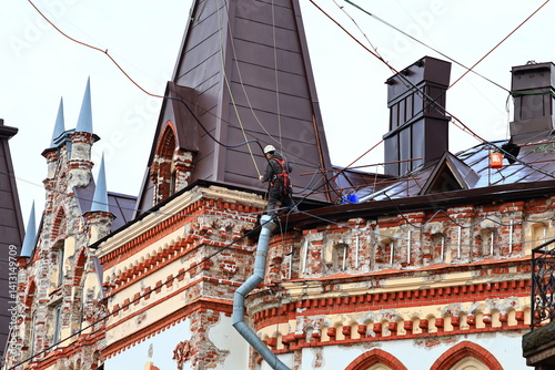 A tall structure with a clock face on the top, often found in city centers.