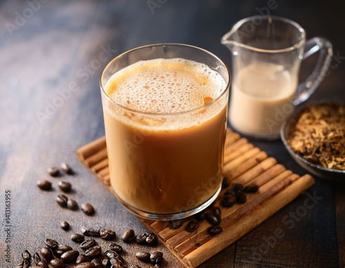 A refreshing glass of Indonesian Es Teh Tarik (pulled tea) with its characteristic frothy top, representing a popular and unique beverage.
