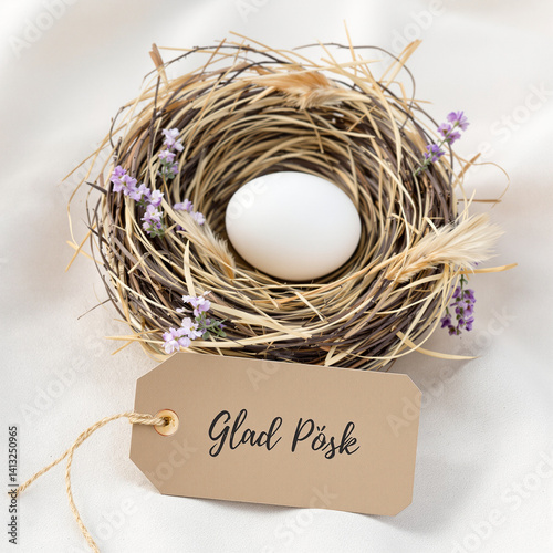 Obraz na płótnie Elegant Rustic Easter Nest with Purple Flowers and Handwritten Tag w salonie