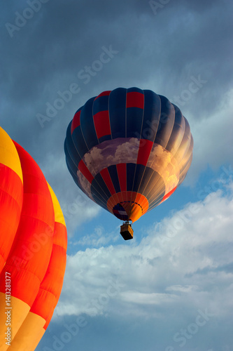 Colorful balloons with bright colors of the domes at the sky with clouds