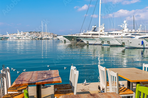 A seaside cafe along the Athenian Riviera at Flisvos Marina, in Palaio Faliro, Greece.