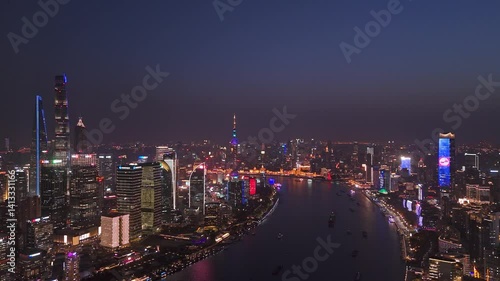Wallpaper Mural 4K Real Time Aerial view of Shanghai skyline with winding river in downtown at night Torontodigital.ca