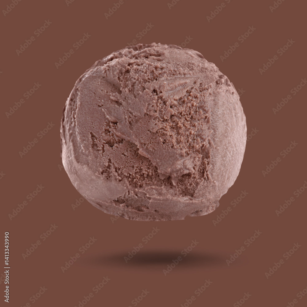 Ice cream scoop in air on brown background. Yummy dessert
