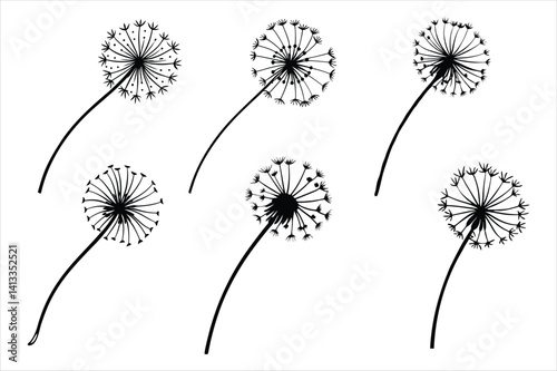 Spring silhouette of a dandelion with seeds flying in the wind