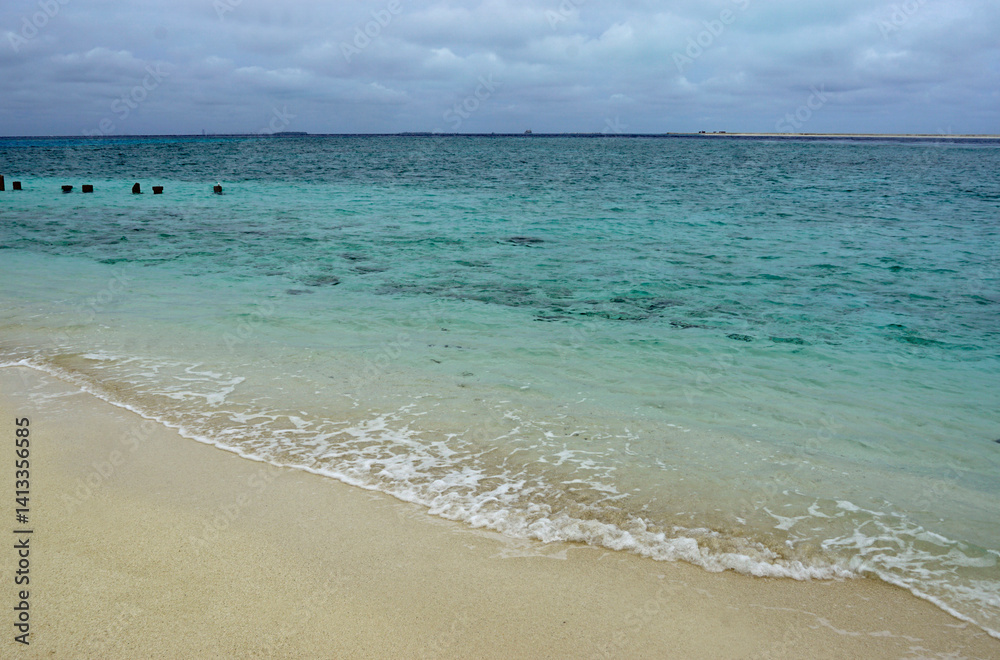 Sunny tropical beach paradise on the Maledives
