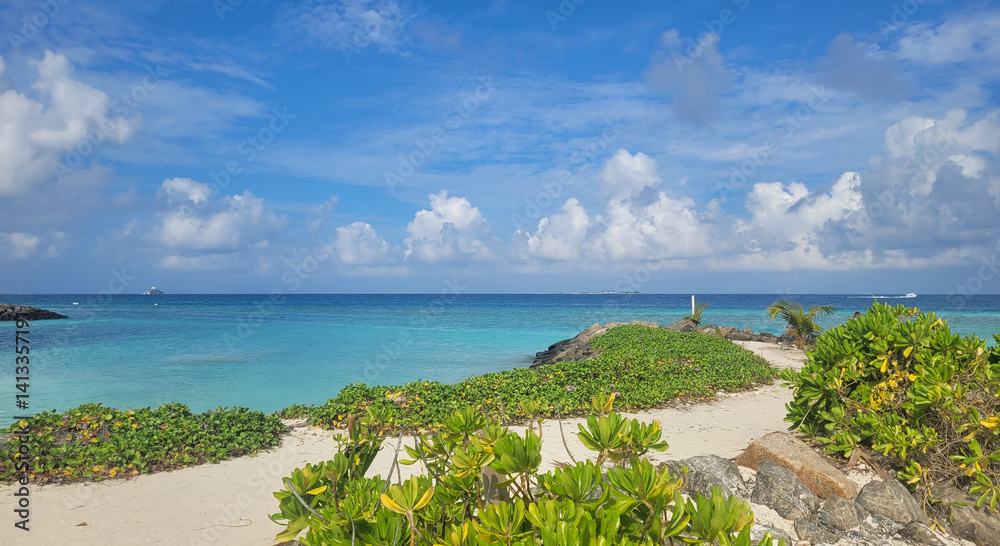 Sunny tropical beach paradise on the Maledives
