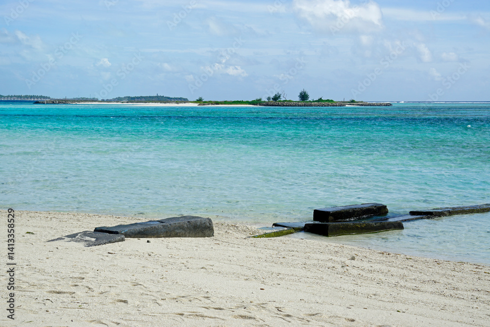 Jetty at Sunny tropical beach paradise on the Maledives