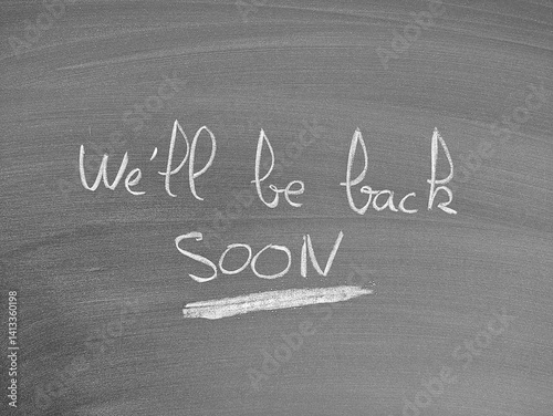 A chalkboard message states, 