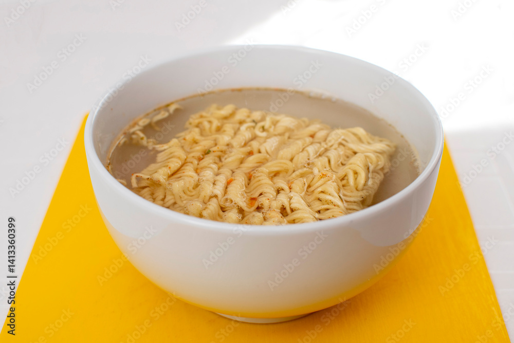 Top view of instant noodles in a bowl Top view of instant noodles in a bowl