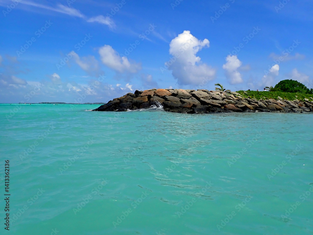 Sunny tropical beach paradise on the Maledives