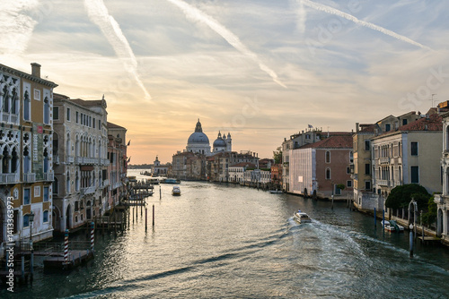 Elevated view of the Grand Canal with Palazzo Cavalli-Franchetti (16th c), seat of the Istituto Veneto di Scienze, Lettere ed Arti, and Punta della Dogana at dawn, Venice, Veneto, Italy photo
