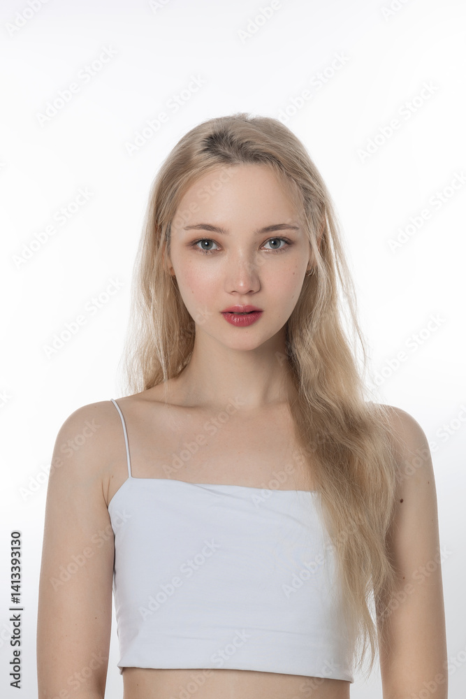 Young attractive asian woman on light background with good skin. Concept of facial care, skin moisturizing, beauty and youth Young attractive asian woman on light background with good skin. Concept of facial care, skin moisturizing, beauty and youth