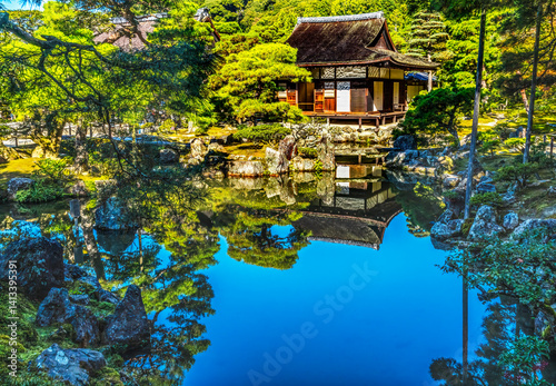 Colorful pond reflection Togu-do Hall, Ginkaku-ji Temple, Kyoto, Japan. Also known as Jisho-ji. photo