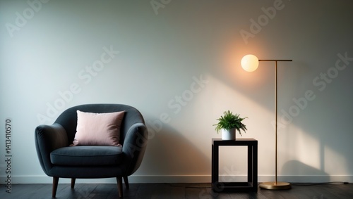 Obraz na płótnie Cozy armchair featuring a pink pillow, illuminated floor lamp against a gray wall backdrop in an office or living room. Minimalistic, contemporary home decor. w salonie