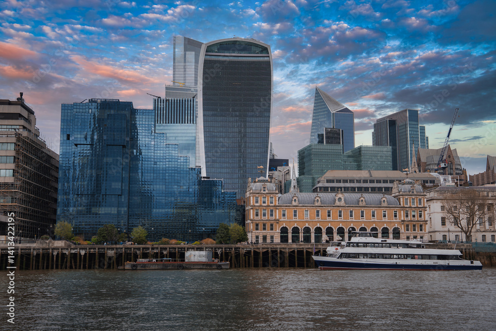 View of London's skyline featuring the Walkie Talkie and Scalpel buildings, the River Thames, a docked boat, and a historic building in the foreground.