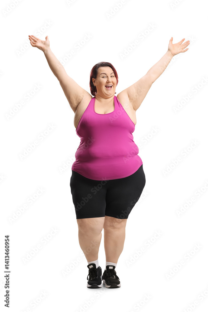 Happy overweight woman in sportswear with arms up Happy overweight woman in sportswear with arms up
