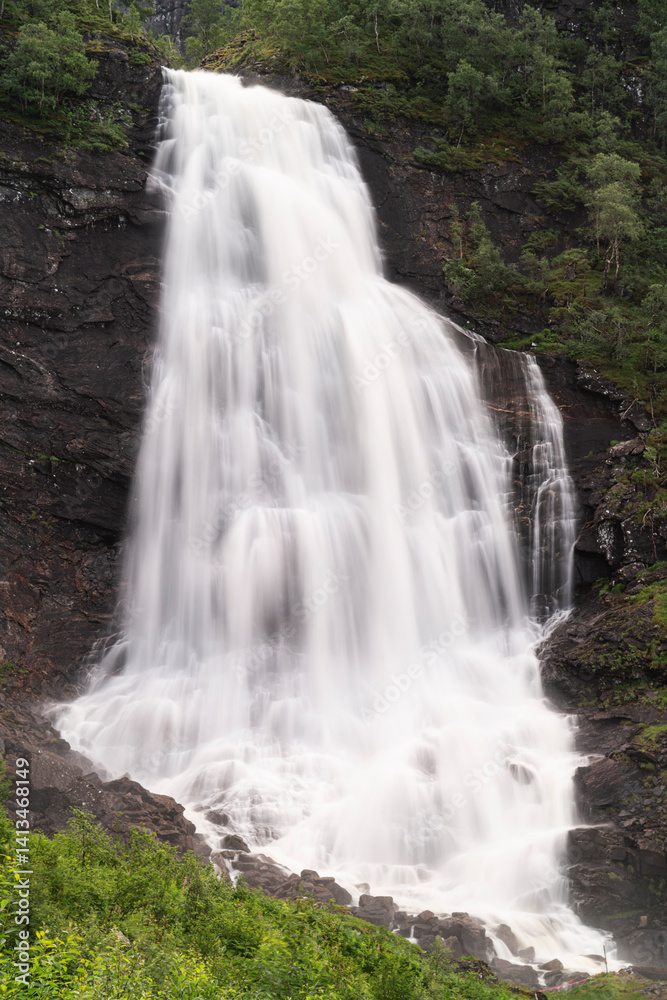 Norway. Fossen Bratte waterfall cascades down cliff. Norway. Fossen Bratte waterfall cascades down cliff.