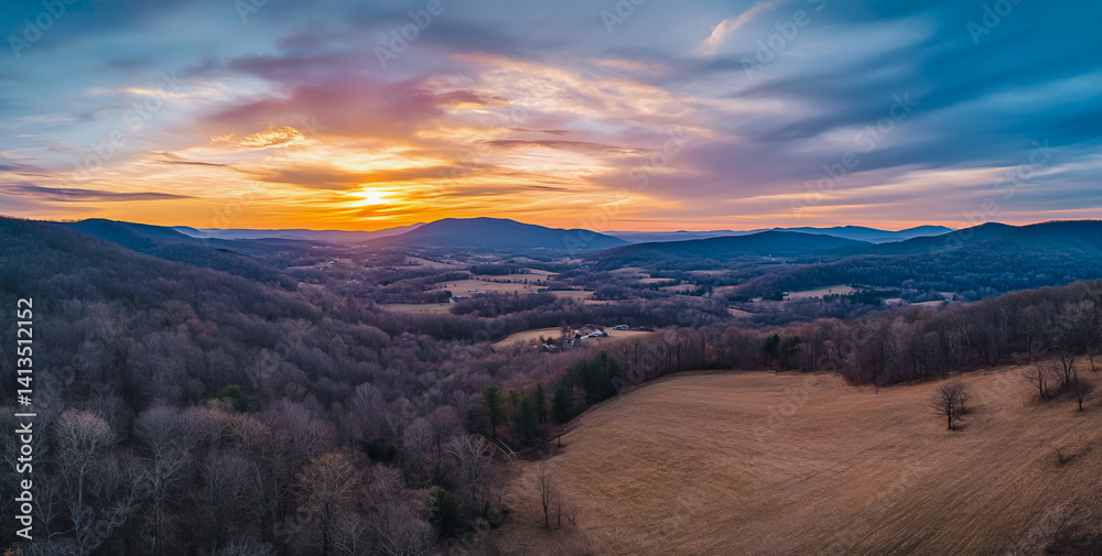 Fototapeta premium Breathtaking panoramic aerial view of forest landscape at sunrise with dramatic sky 
