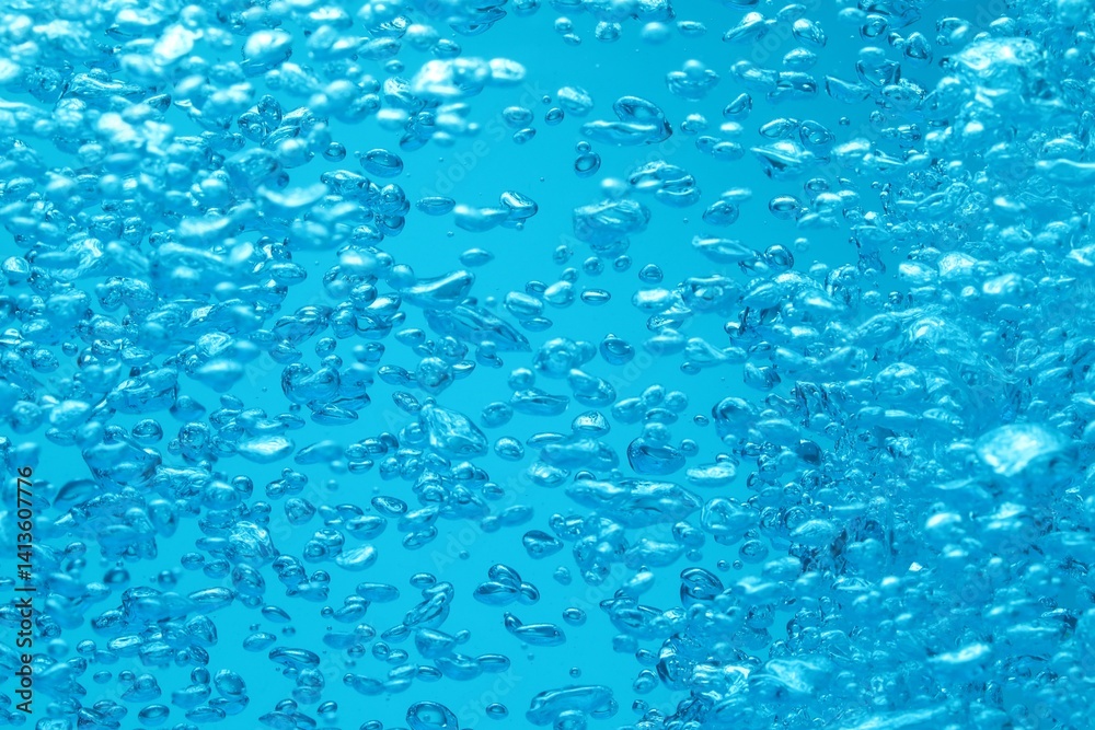 Many water bubbles on blue background, closeup Many water bubbles on blue background, closeup