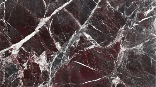 Textural detail of deep maroon and grey marble.