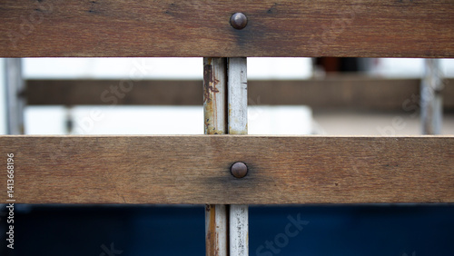 Close up of old wooden bench. Selective focus and shallow depth of field.