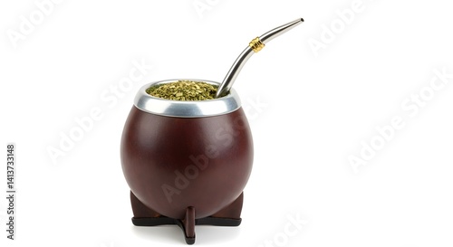Traditional Mate cup and metal straw filled with yerba mate, isolated on a white background.