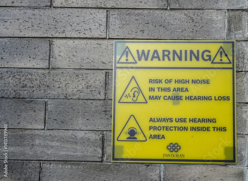 Warning Sign Risk of High Noise and Hearing Protection Area