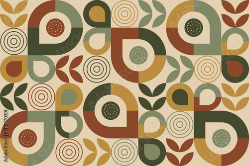 A colorful abstract geometric pattern featuring retro shapes like teardrops, leaves, and concentric circles in earthy tones of mustard, olive, rust, and cream.