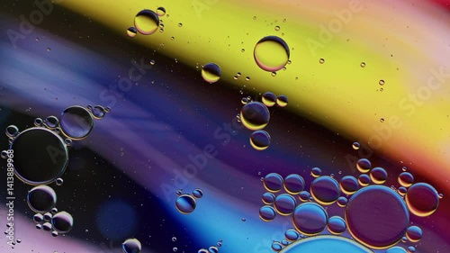 Colorful Oil Bubbles Moving on a Water Surface