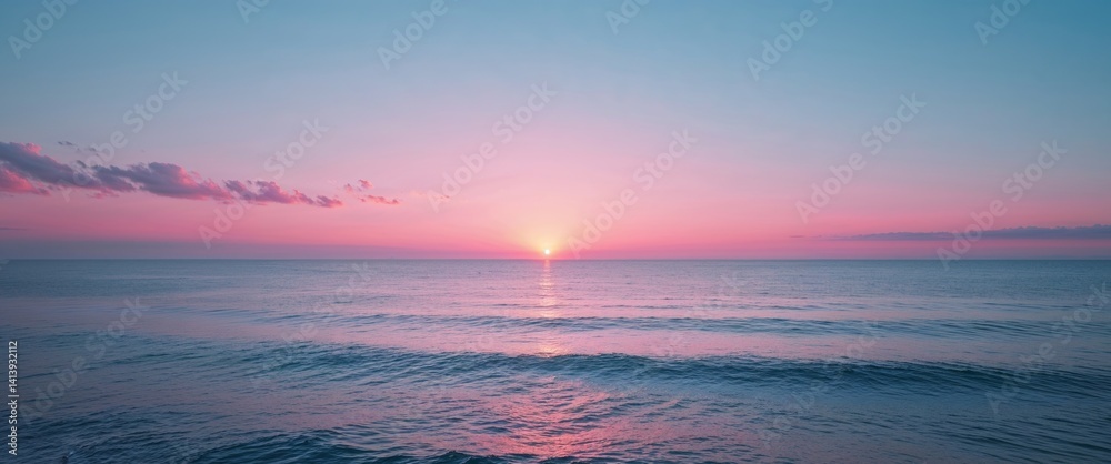 Fototapeta premium Serene Pink And Blue Coastal Sunset Over Calm Ocean