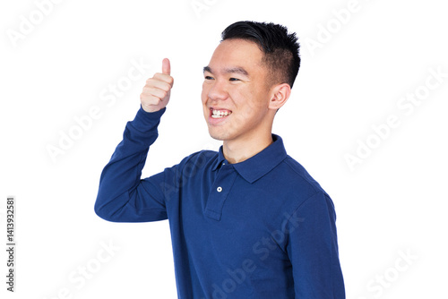 A young man in a blue long-sleeve polo shirt gives a thumbs up while smiling, captured from a side angle. Suggests support, positivity, or confident agreement with a more candid, natural feel.