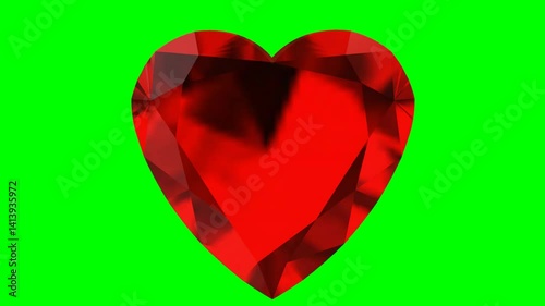 Heart cut diamond ruby Rotating on green screen background.