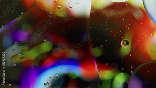 Colorful Oil Bubbles Moving on a Water Surface
