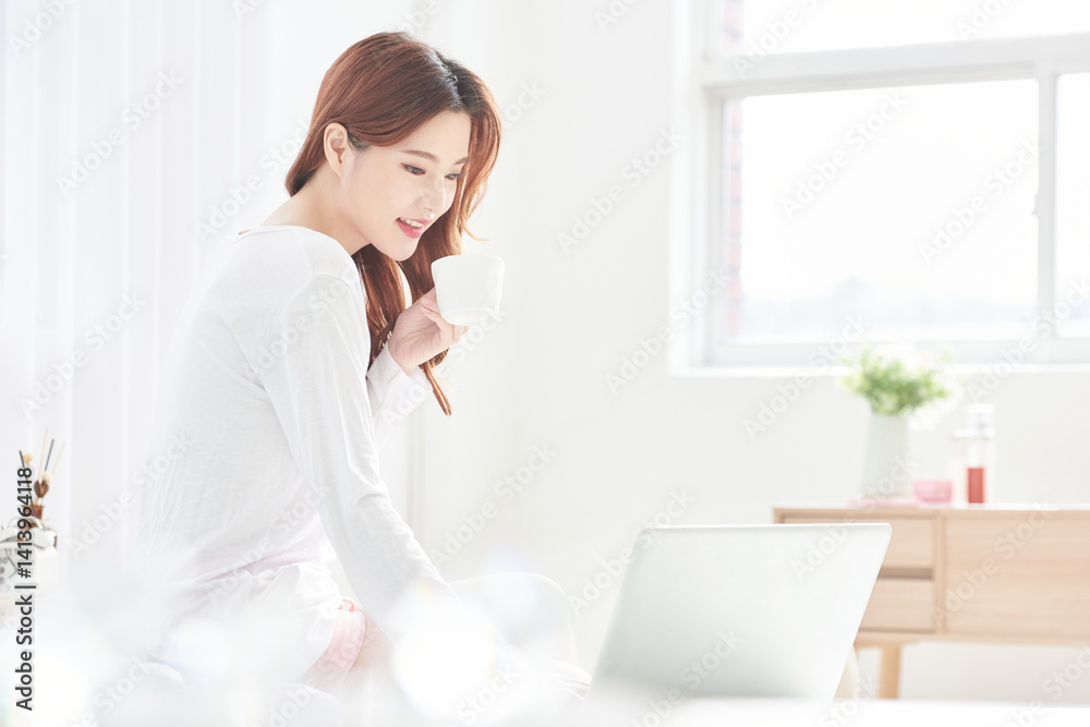 Morning Routine with Coffee and Laptop in Bright Room Morning Routine with Coffee and Laptop in Bright Room
