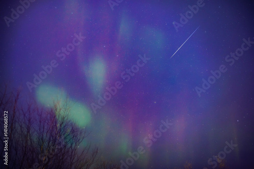 Obraz na płótnie Aurora borealis, polar lights with Milky Way stars. w salonie