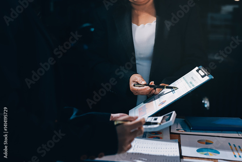 Business analyze,Close up Business people meeting to discuss the situation on the market. Business Financial Concept
