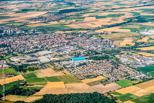 Obraz na płótnie aerial of Gross Gerau with view to old historic village and modern industry area w salonie