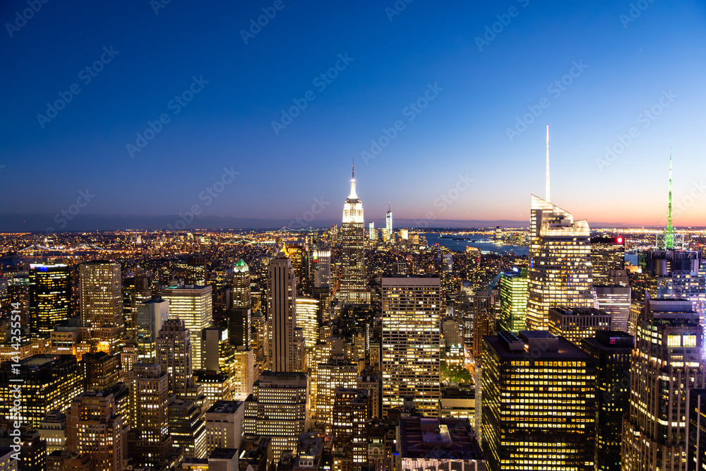 aerial skyline of new york by night